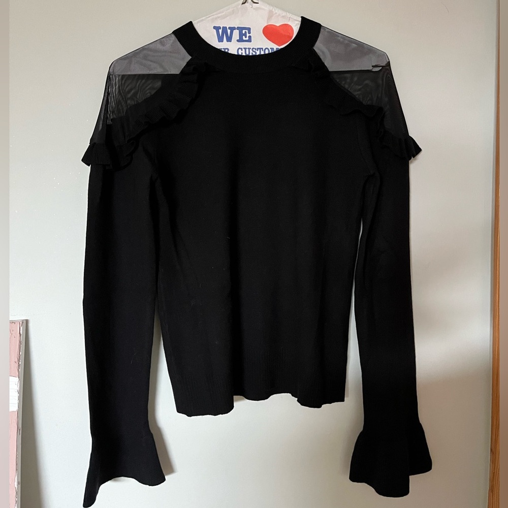 APRICOT brand black sweater top with mesh and ruffle shoulder detail
